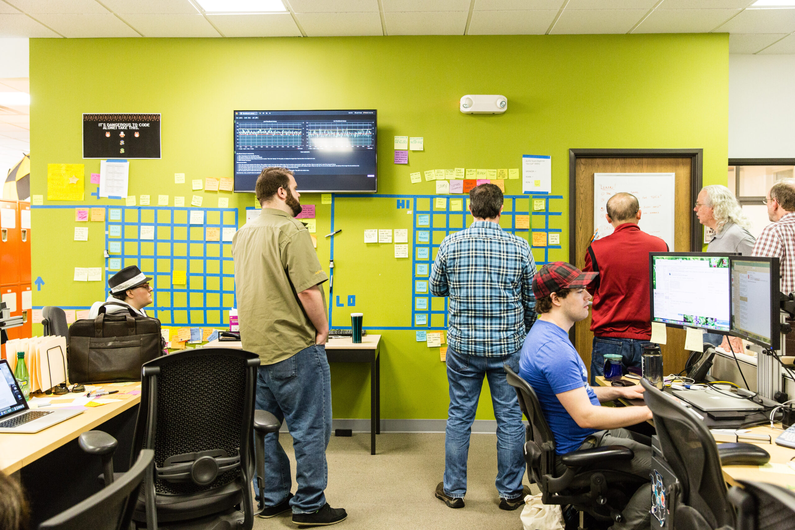 Colleagues sprint planning in the Ann Arbor office